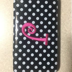Black & white polkadot wallet with pink J